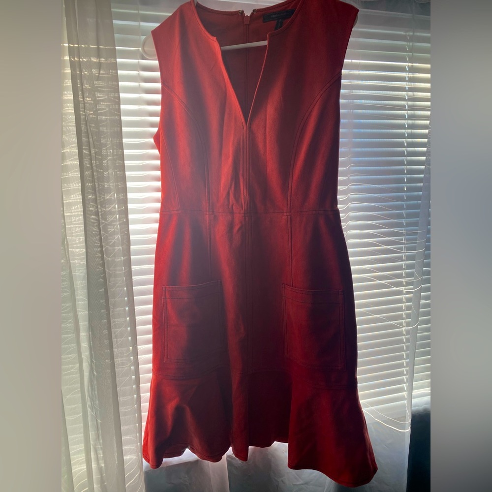 Red w a coral hint, midi suede BCBGMaxazria dress.